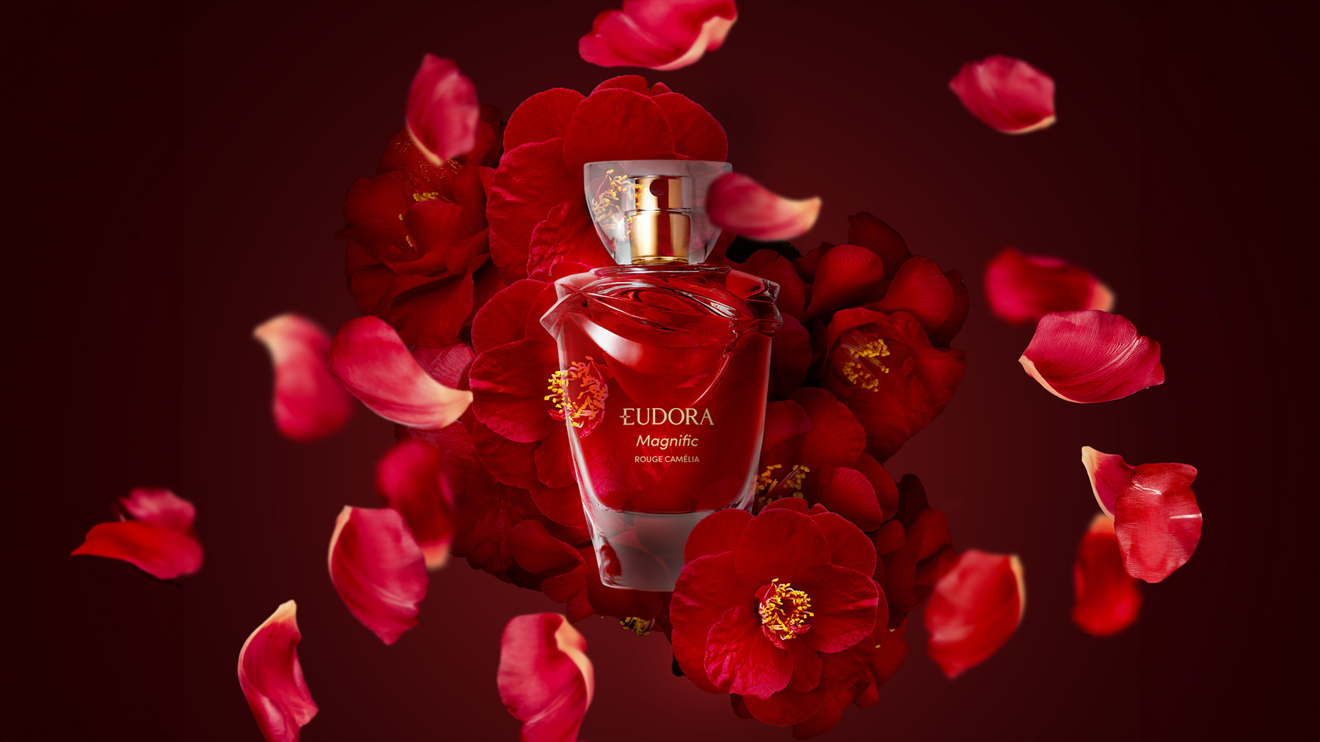 <span style = 'font-size:120%; font-weight: bold;'>Eudora Magnifique Rouge Camélia</span><br>Magnific Rouge Camélia dá continuidade a uma história de ousadia e força, em um design estrutural inédito. O formato icô...